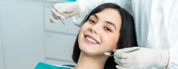 woman smiling in the dental chair
