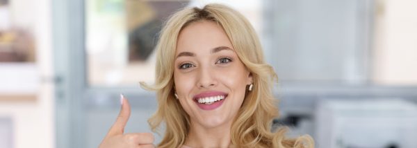 woman giving a thumbs up