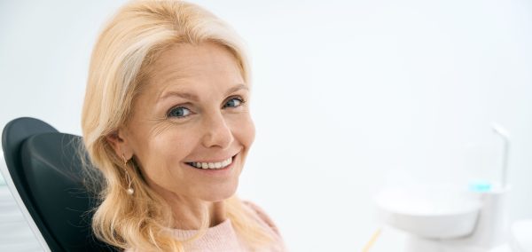 Older woman smiling in the dental chair